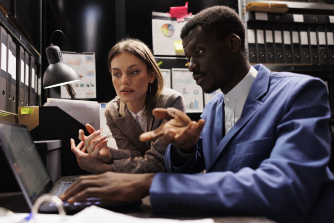 Businesspeople working overhours